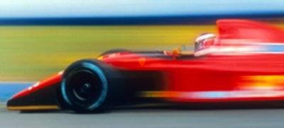 Long Exposure of Red F1 Car Driving