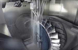 A metal component being machined close-up