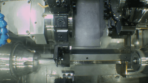 A metal component being machined close-up