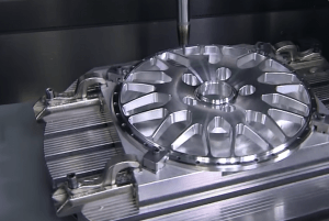 A metal component being machined close-up