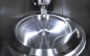 A metal component being machined close-up