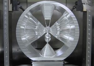 A metal component being machined close-up