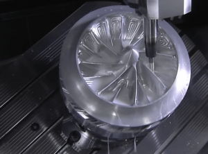 A metal component being machined close-up