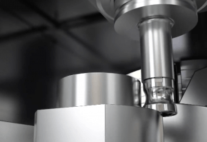A metal component being machined close-up