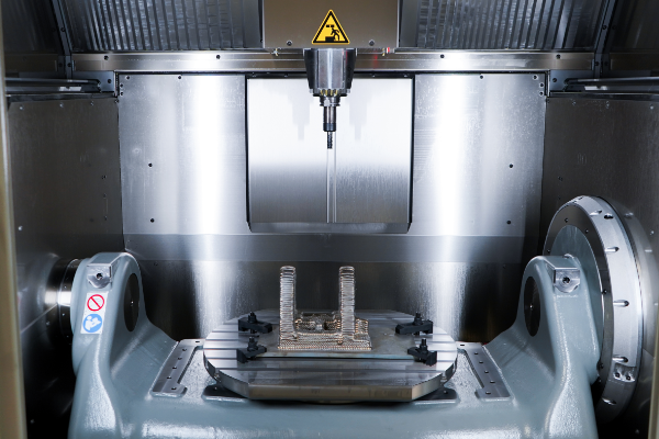 a close-up image of a 5 axis machine