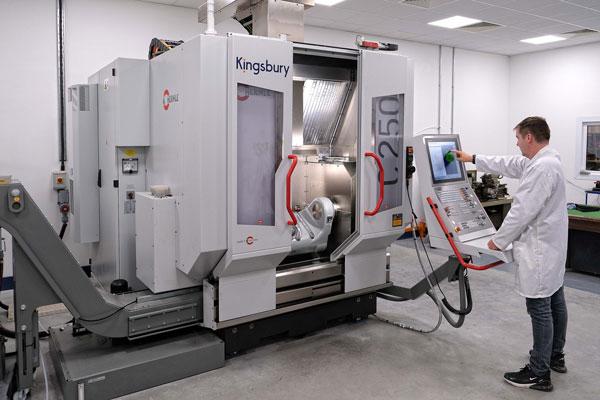 technician operating a Hermle C250