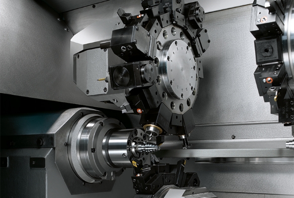 Quadruple-spindle lathe doubles output