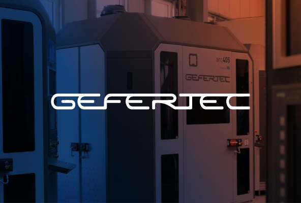 Gefertec logo infront of machine