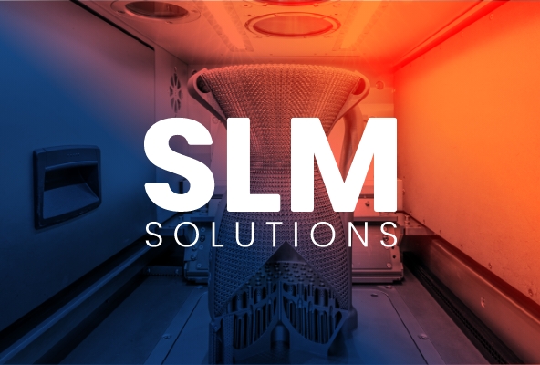 SLM Solutions logo in front of machine