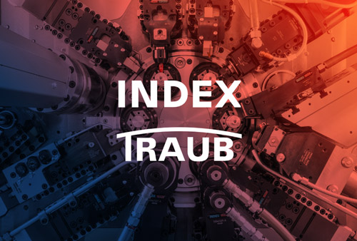 Index Traub White Logo on Multi Spindle Machine Background