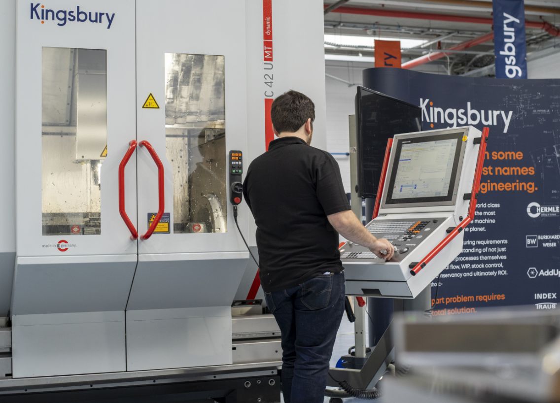 Engineer working on a Hermle C42 U machine