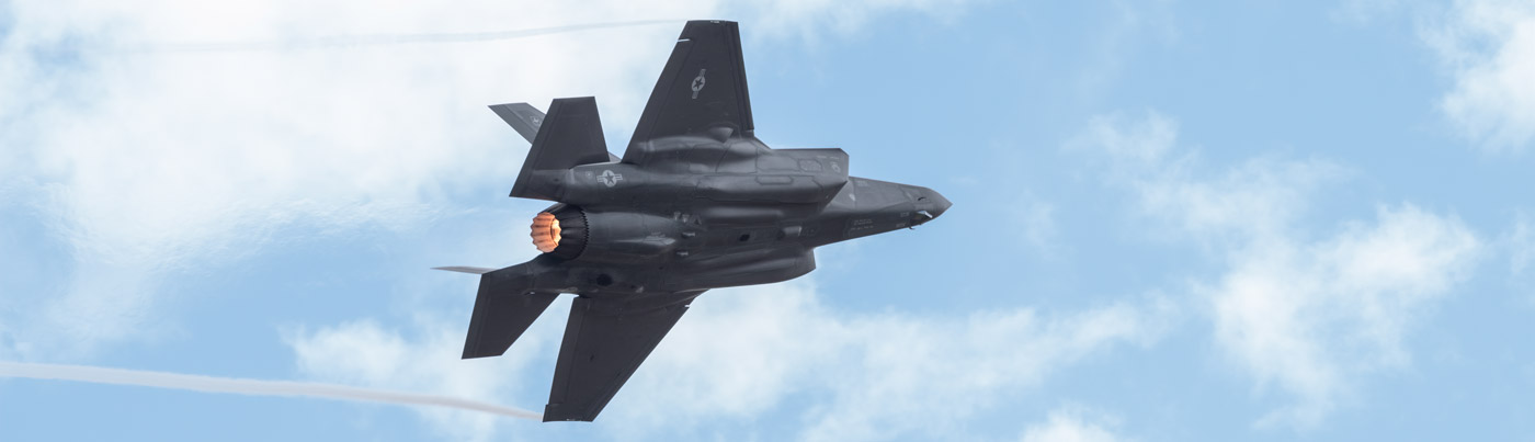 fighter jet style plane in the sky