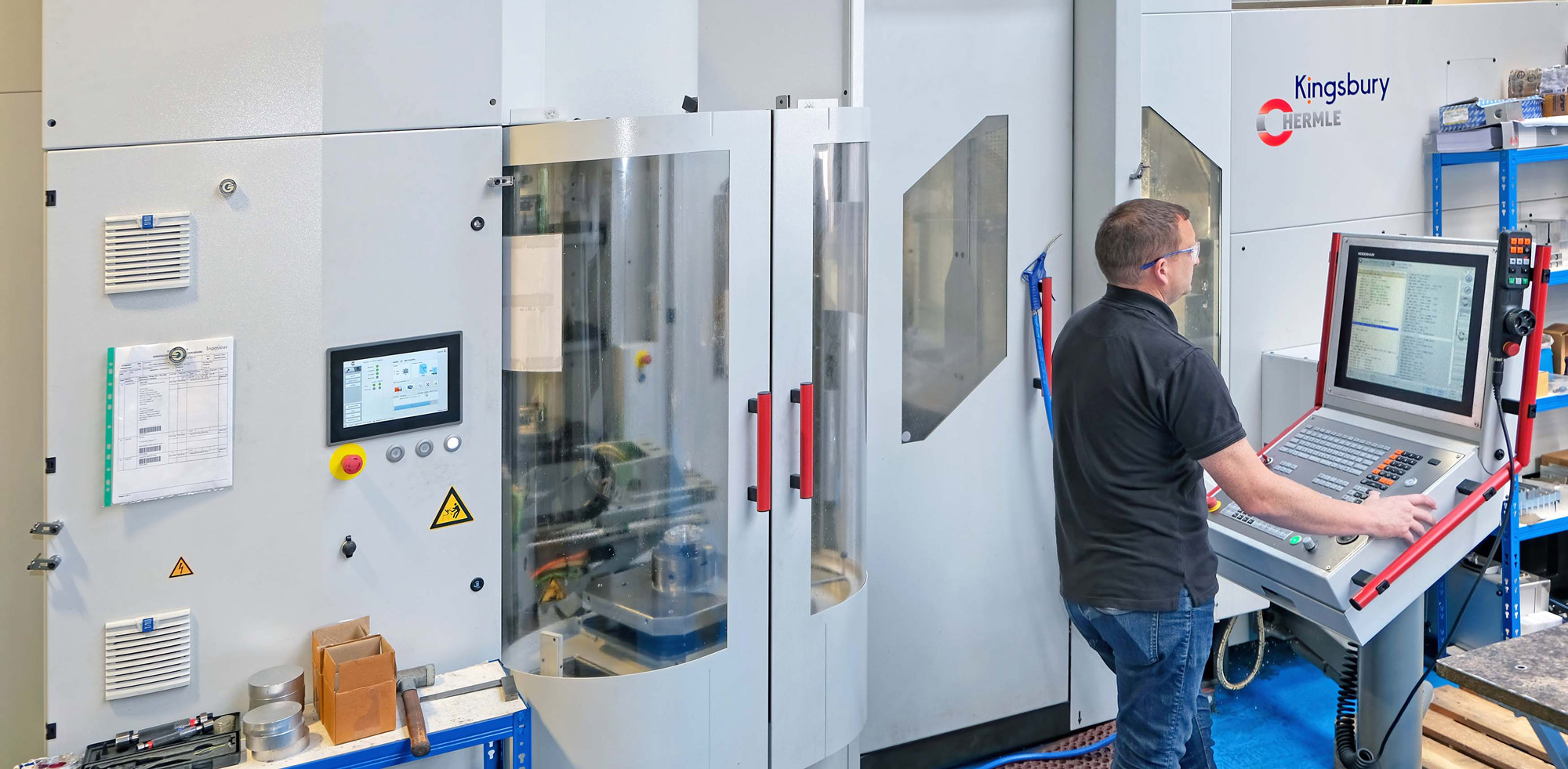 Engineer working by a Hermle machine