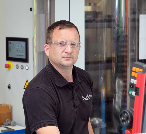 Engineer working by a machine