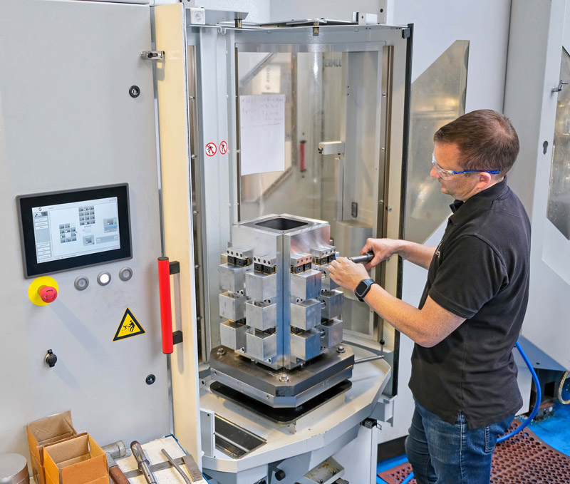 Engineer working in a machine