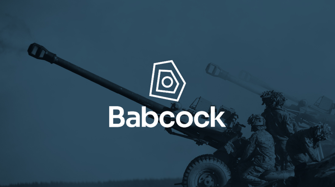 Army soldiers on a vehicle with the babcock logo overlaying the image