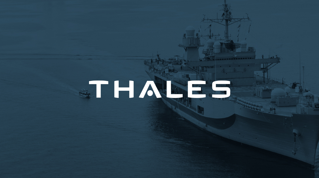 An image of a ship in an ocean with the Thales logo overlaying the image