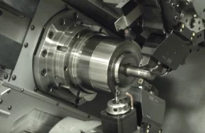 A metal component being machined close-up