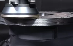 A metal component being machined close-up