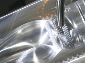 A metal component being machined close-up
