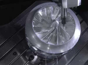 A metal component being machined close-up