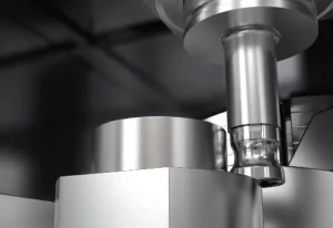 A metal component being machined close-up