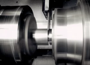 A metal component being machined close-up