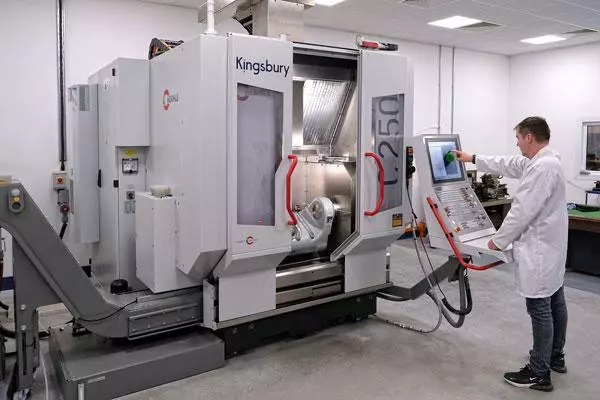 technician operating a Hermle C250