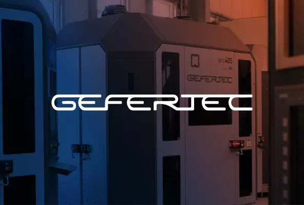 Gefertec logo infront of machine
